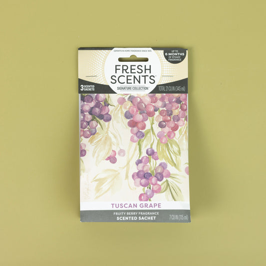 Fresh Scents Tuscan Grape - Sachet 3pk features flameless air freshener sachets with purple and pink grape clusters on a light green background, offering a fruity berry scent and long-lasting fragrance.