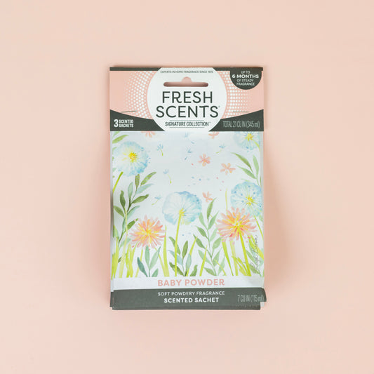 The Fresh Scents Baby Powder - Sachet 3pk provides a flameless, long-lasting air freshener with pastel floral packaging. Includes three scented sachets for up to six months of freshness.